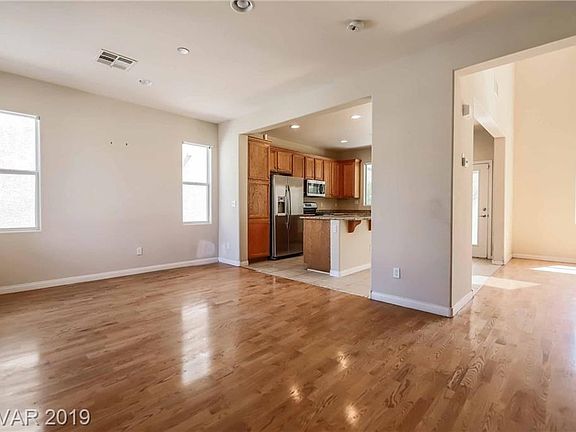 Beautiful wood floors and soft natural light welcome you in.