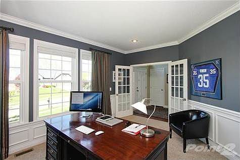 The study is finished with the highest quality work and craftsmanship featuring French Doors, crown molding, paneled walls, custom blinds, designer paint and recessed lighting.