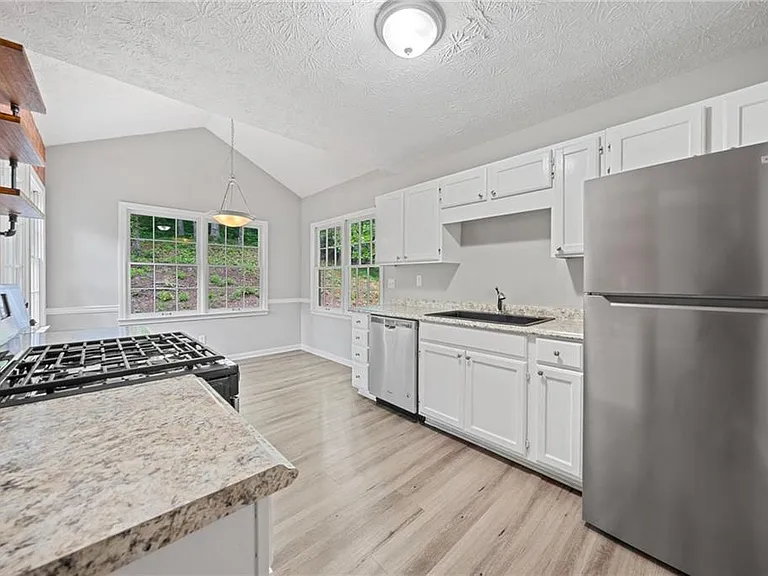 5590 Princeton Oaks Dr — Photo 16