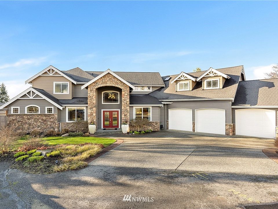 Welcome home to the epitome of Northwest living! Original owner of this beautiful custom craftsman