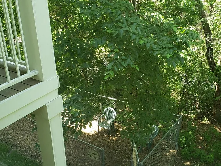 Livingroom overlook shows another scenic gated area