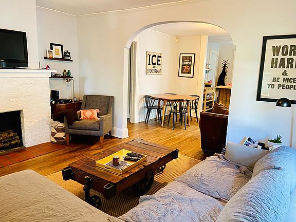 Living room view to dining and kitchen