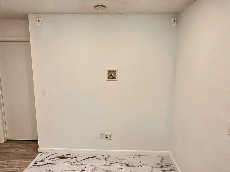 Kitchen/Dining with media center wiring and speaker hookup.