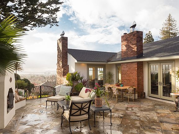 Patio off of family room with views and kitchen
