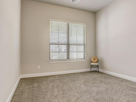 1st Bedroom down at Front of home overlooking Front Porch