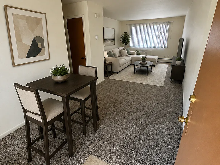 Living room and dining area with furniture added to show space