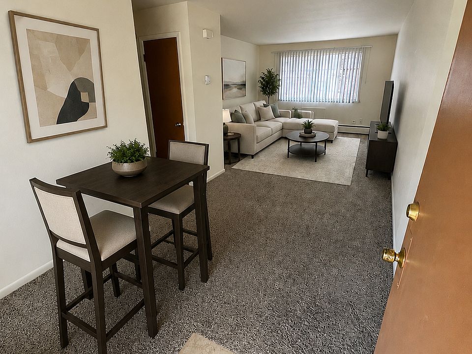 Living room and dining area with furniture added to show space