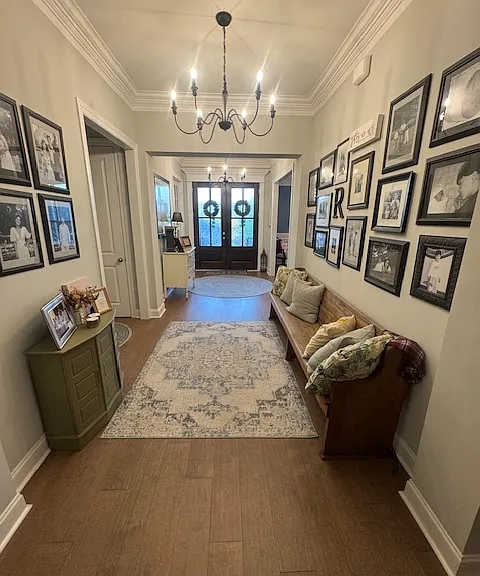 Long foyer invites you into the main living area.