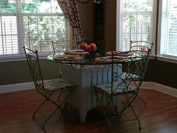 Dining area features lots of light and space