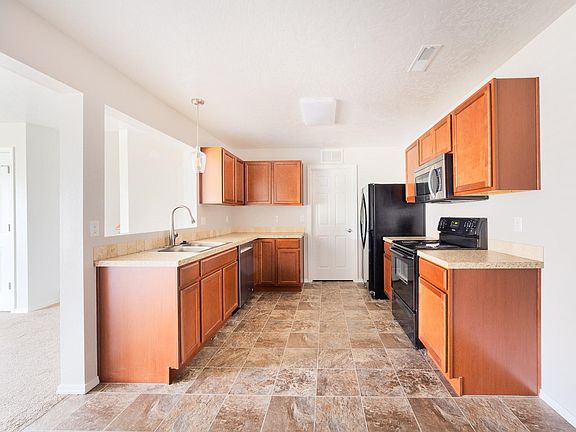 Kitchen (has new plank flooring)