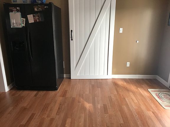 Barn door slider to laundry