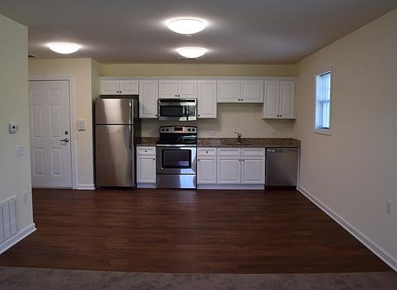 Looking into the Kitchen & Dining Area from the Living Room.