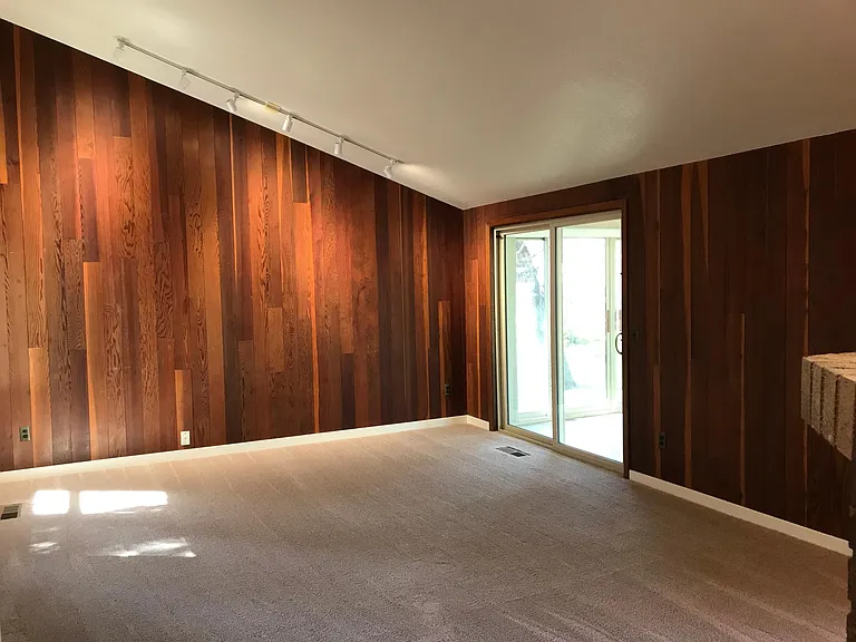 Wood-panelled living room