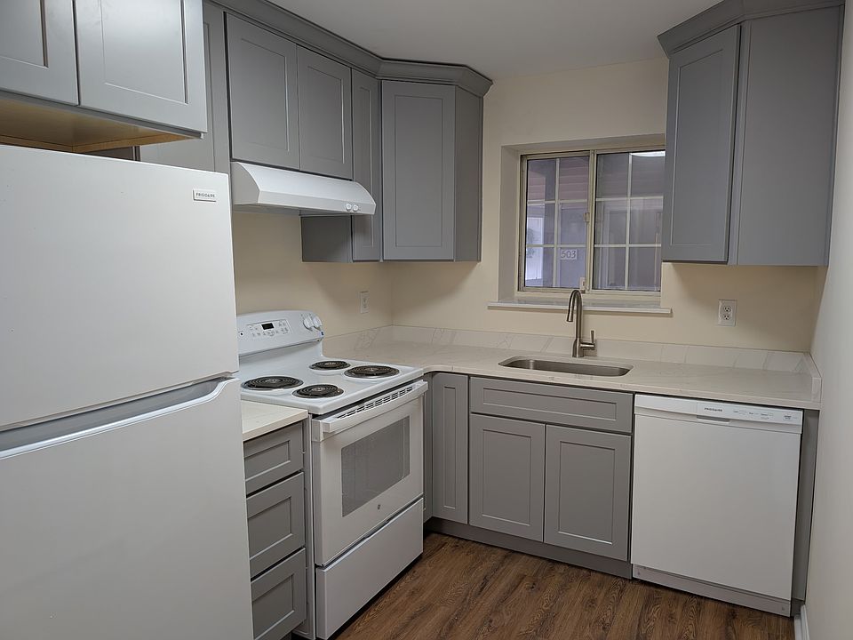 Kitchen with new cabinets, quartz countertops ad new appliances.