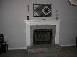 Large living room with gas fireplace.