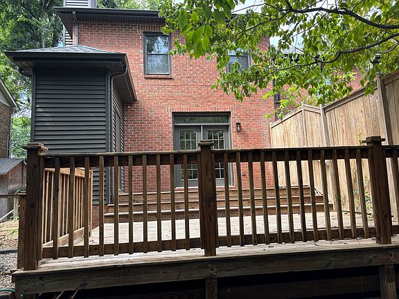 Large private back deck. Privacy screen from adjoining townhouse.