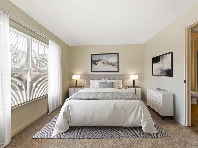 Phase I Renovated Package I apartment bedroom with carpet