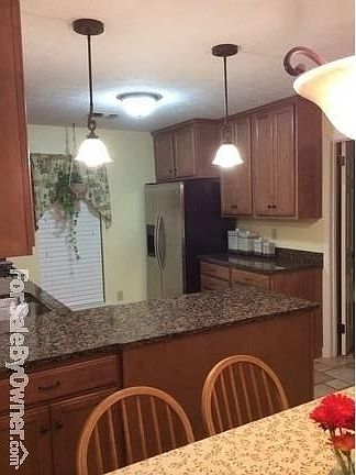 Kitchen right side
						:
						Granite countertops