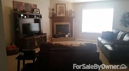 Vaulted Ceiling & Fireplace
						:
						Family room has vaulted ceiling and gas fireplace with mantle.