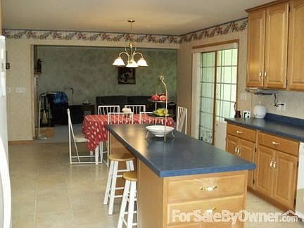 Master Bedroom
						:
						This view is from the entrance door to the bedroom. The room has patio access.