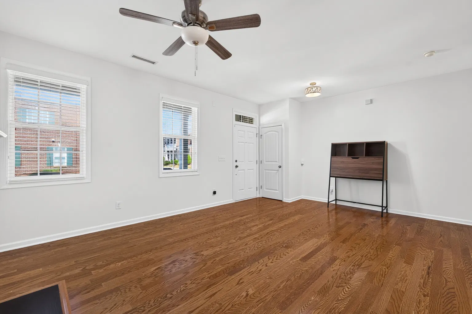 Real listing open-concept interior at 1343 Still Monument Way