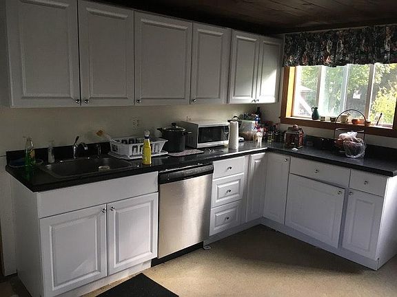 Kitchen counters, cabinets, dishwasher, all new