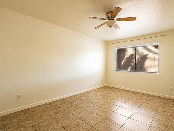 Unfurnished bedroom — representative home at Fairway Vistas Condominiums.