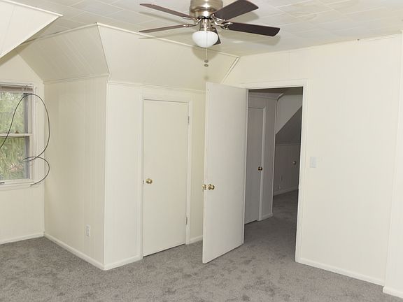 Master bedroom with entranceway into the living room.