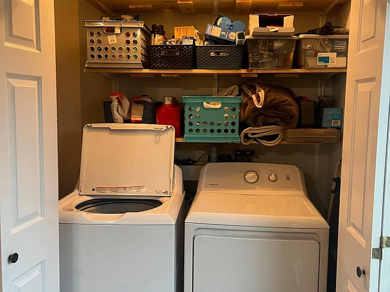 Washer & dryer located off kitchen.