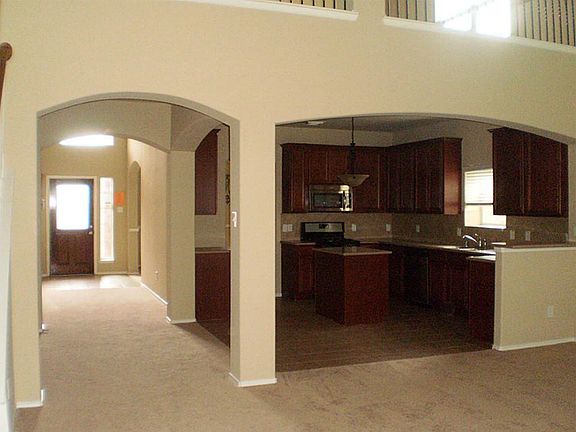 Entry coming from dinning room hallway to the living room.