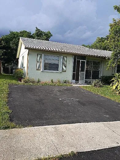 6761 NW 24th Ct — Photo 2