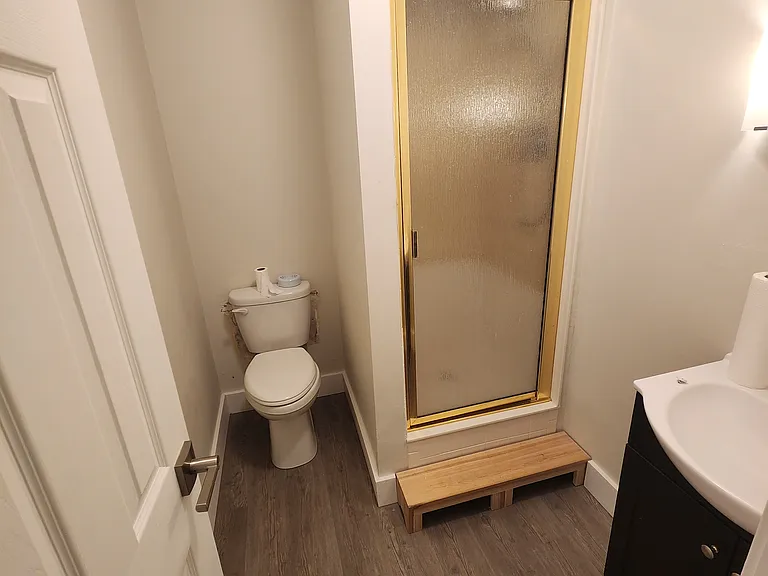 first level bathroom with shower. brand new toilet, vanity and sink fixtures, new shower head