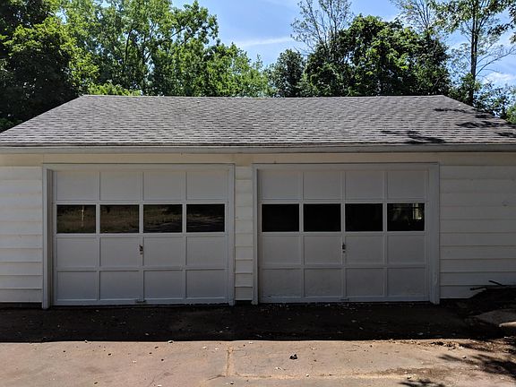 2.5 Car Garage features lights and electric door openers.