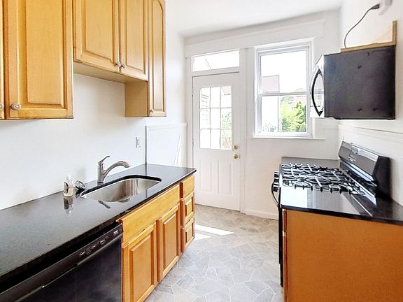 Kitchen (w/ access to sunny outdoor deck)