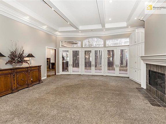 Great Room has beautiful views, fireplace and built-in cabinets