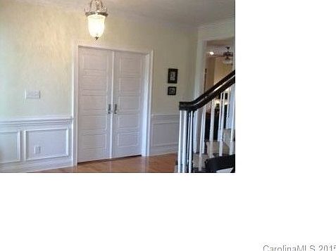 Entryway - doors to study & stiarcase