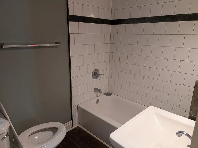 Front/first bathroom includes full size bathtub.
