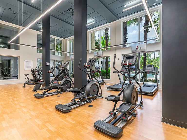 Modern Fitness Center with Ellipticals and Treadmills