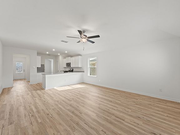 The open-concept layout of this home is perfect for entertaining!