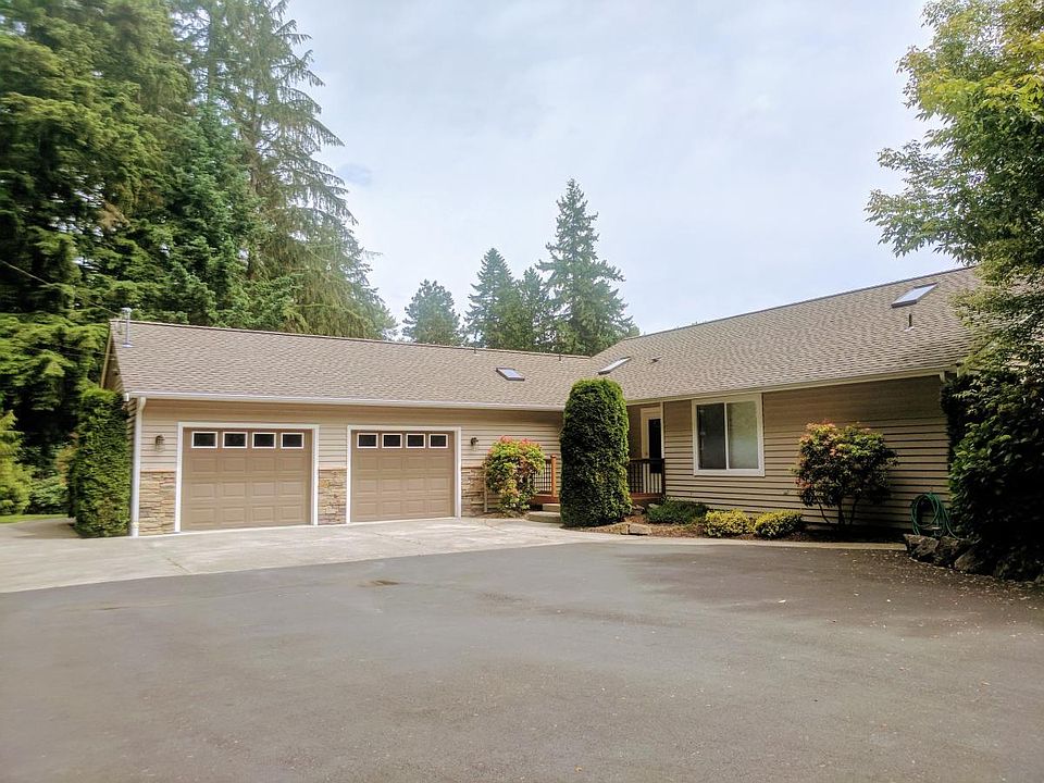 large driveway and secure garage space