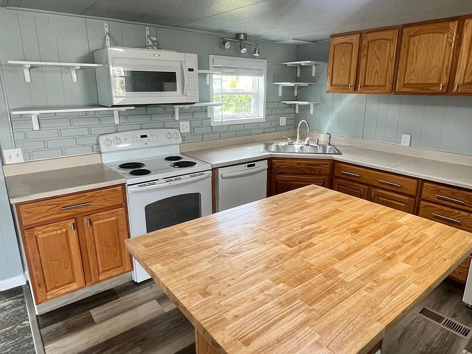 kitchen with butcher block bar seating