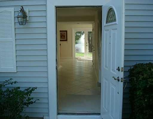 View of lake fountain as you walk through the front doors.