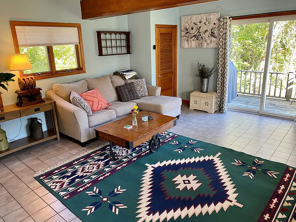 Open plan Kitchen/Living room with sliding door to the deck