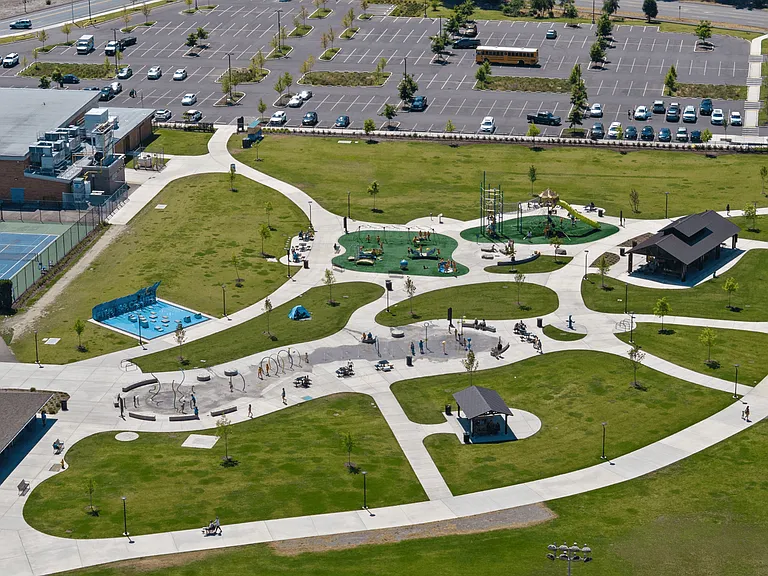 Nearby Sprinker Recreation Center offers playgrounds, water features, sports courts, picnic areas, and walking paths.