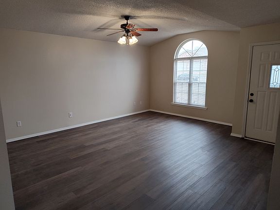 Front room, 18X16 cathedral ceiling, sunrise window.