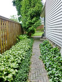 Brick Walkway to Backyard