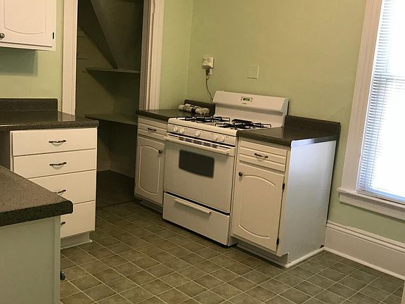 Large kitchen with newer appliances, pantry, and lots of cab
