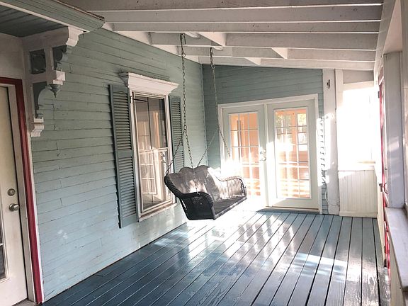 Large, private screened porch with swing. Freshly painted and full of sun.