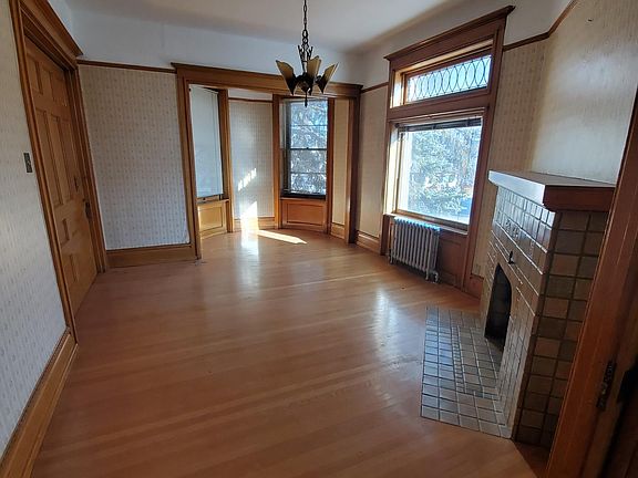 Front room - looking towards the bay window, while standing in the middle room.
