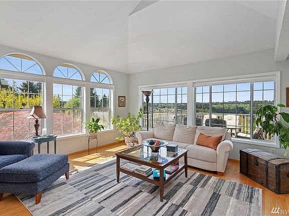 Huge windows, high ceilings and stunning views makes this room the centerpiece of the home.